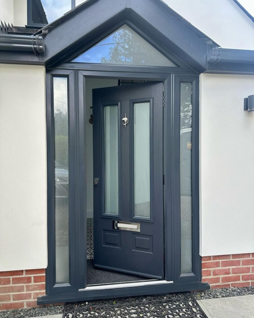 Composite front entrance door with side panel in porch
