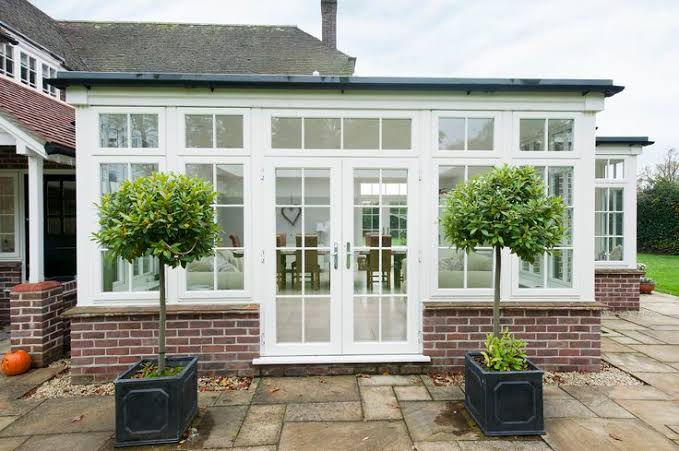 French doors in conservatory orangery to garden