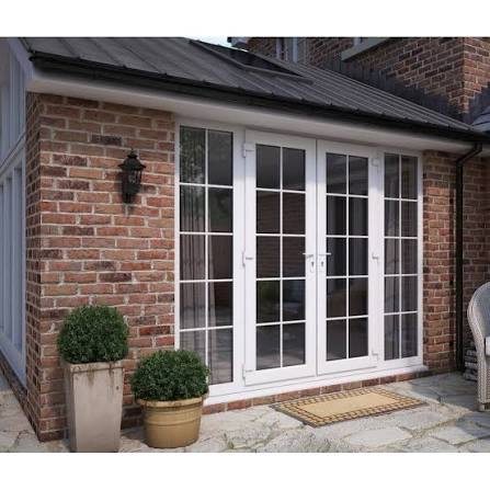  White uPVC French doors opening to garden patio